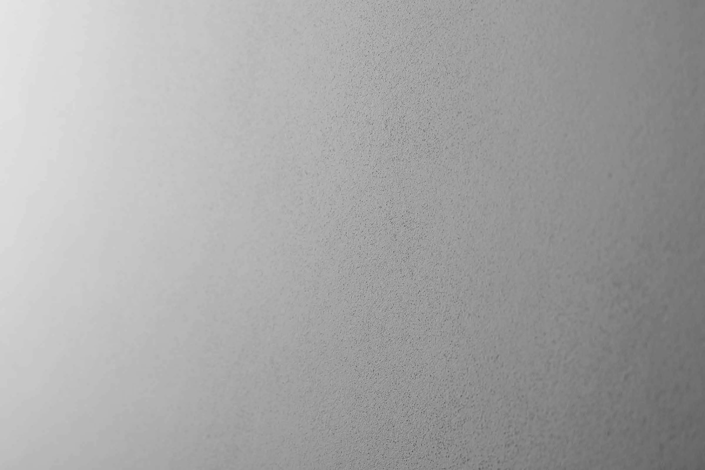 Filzputz, Fassadenputz StoSignature Texture Fine 40, feine graue Putzoberfläche